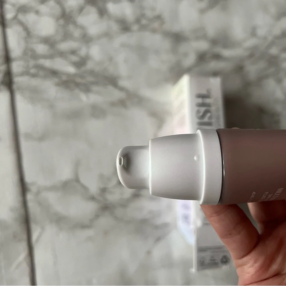 glowish by huda beauty multidew skin tint 10 deep tan July sale